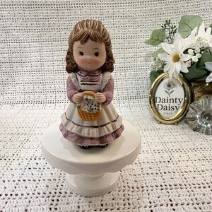 Porcelain Figurine with Basket